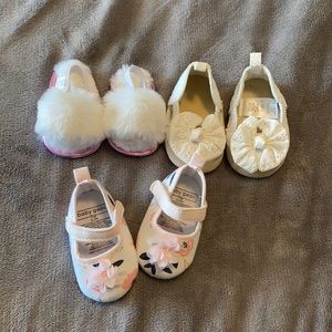 Three pairs of crib shoes never worn